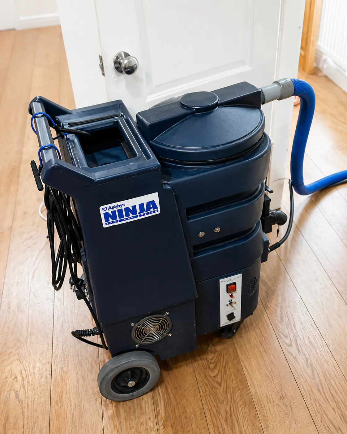 Carpet extraction machine set up indoors