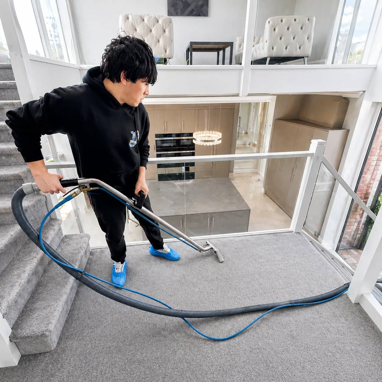 Stair carpet being cleaned